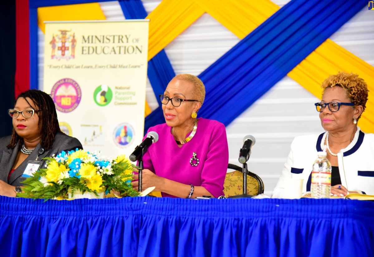 Minister of Education and Youth,  Hon. Fayval Williams (centre), fields questions during a consultation with school leaders and deans of discipline on the development of a new student dress and grooming policy at Jamaica College in Kingston on Tuesday (August 9). She is flanked by Community Relations Education Officer for the Ministry’s Region 5, Anieta Bailey (left) and Acting Permanent Secretary in the Ministry, Maureen Dwyer. 