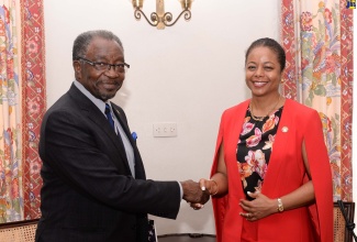 Minister of Legal and Constitutional Affairs, Hon. Marlene Malahoo Forte (right), greets United States Ambassador to Jamaica, His Excellency Nick Perry, during a call by the Ambassador on the Minister, at Office of the Prime Minister (OPM) on Tuesday (August 2). 