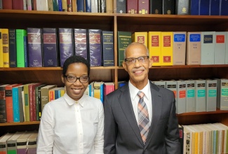 Registrar at the Court of Appeal, Stacie-Anne Brown (left), with President of the Court of Appeal, the Honourable Mr. Justice Patrick Brooks. 