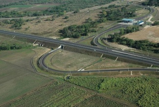  An aerial view of the East West leg of Highway 2000 and the Spanish Town Toll Plaza

 