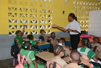 Grade-two teacher of Coke’s View Primary School in the Galloway District of Westmoreland, Andrene Murray-Porter, engages her students as in-class learning begins on the first day of the 2022/23 academic year, on Monday, September 5.