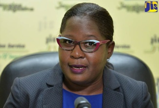 Director of Communications at the Consumer Affairs Commission, Latoya Halstead, addresses a JIS ‘Think Tank’,  on  September 13. 