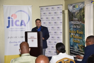 Minister without Portfolio in the Ministry of Economic Growth and Job Creation, Senator the Hon. Matthew Samuda (at podium), addresses the Japan International Cooperation Agency (JICA)/National Environment and Planning Agency knowledge-sharing workshop on marine plastic litter, held at Hotel Four Seasons on August 31.