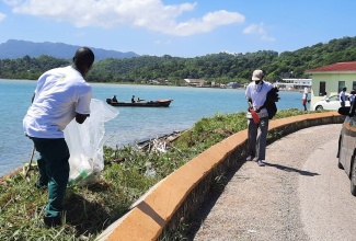 Volunteers remove garbage from the Lucea Fisherman’s Beach on Saturday (September 17) as part of International Coastal Cleanup Day (ICCD) activities. 