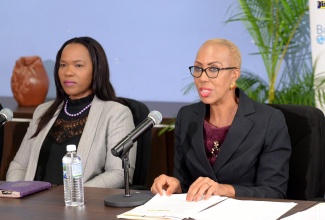 Minister of Education and Youth, Hon. Fayval Williams (right), addresses a press conference on the results of this year’s secondary-level external examinations at the Ministry’s office in Kingston, on Wednesday (September 7). Beside her is Acting Chief Education Officer, Dr. Kasan Troupe.