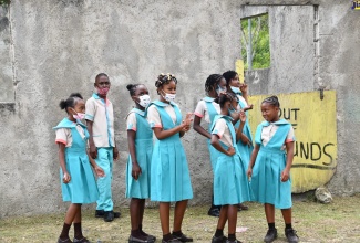 Students at the Steer Town Primary and Junior High School on opening day at the St. Ann-based institution.