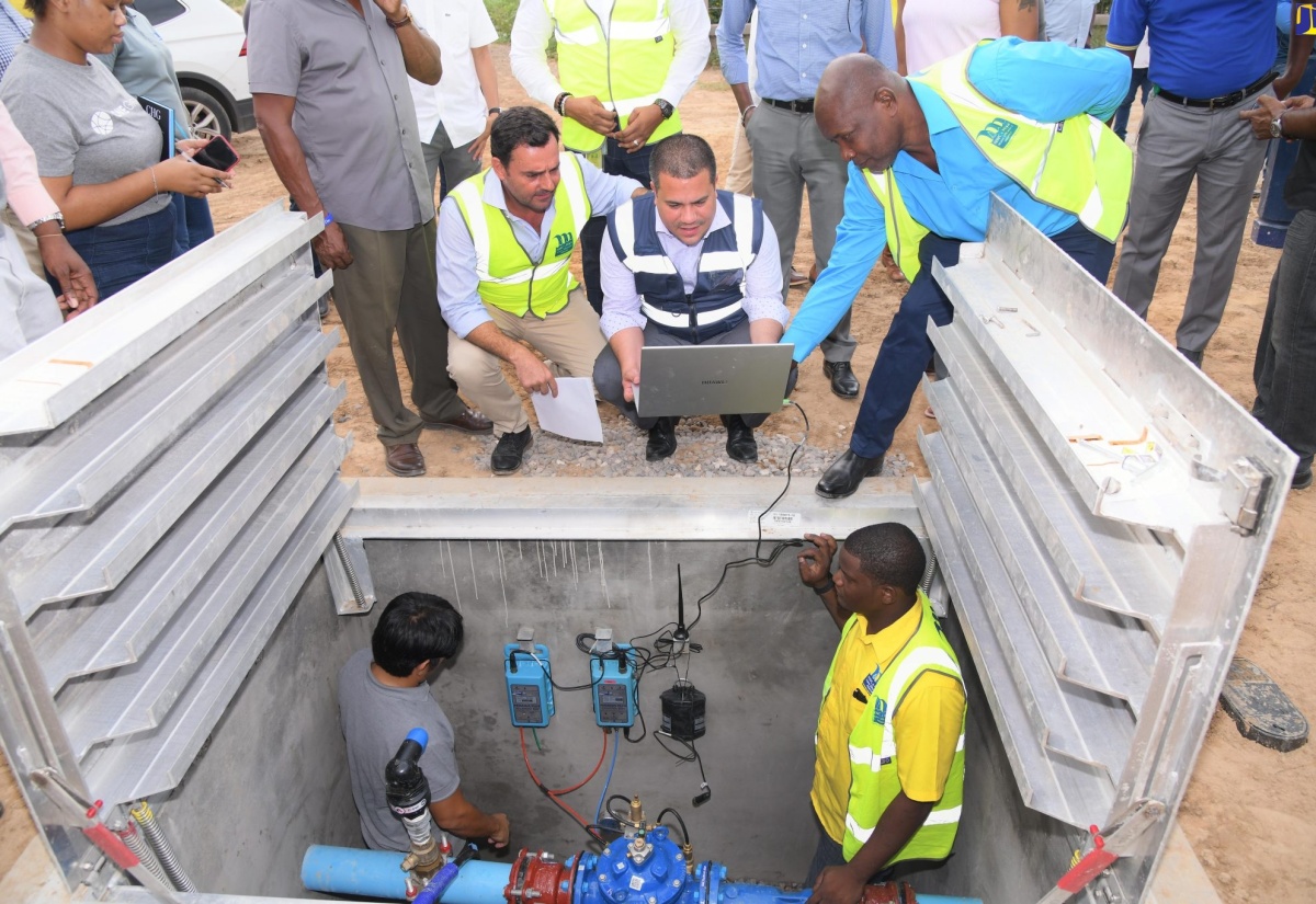 PHOTOS: Minister Samuda Tours the NWC’s Non-Revenue Water-Reduction Project Areas in Portmore