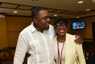 Minister without Portfolio in the Office of the Prime Minister with Responsibility for Information, Hon. Robert Morgan (left), greets globally acclaimed actress, Sheryl Lee Ralph, following her arrival at the Norman Manley International Airport in Kingston on Saturday (October 15) for the National Honours and Awards Ceremony at King’s House on Monday (October 17). Ms. Ralph will be bestowed with the Order of Jamaica (Honorary) for sterling contribution to the international film industry as an Actress, and a Cultural Ambassador for Jamaica. The ceremony is the principal event in observance of National Heroes Day on Monday.