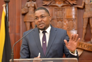 Minister Without Portfolio with responsibility for Information in the Office of the Prime Minister, Hon. Robert Morgan, speaking at a post Cabinet Press Briefing held at Jamaica House on Wednesday (October 12). 
