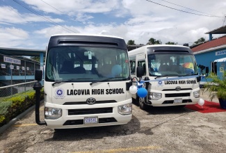 The two coaster buses that were handed over to the Lacovia High Schoo, in St. Elizabeth, on October 7, by the Grant Assistance for Grassroots Human Security Project of the  Government of Japan .  