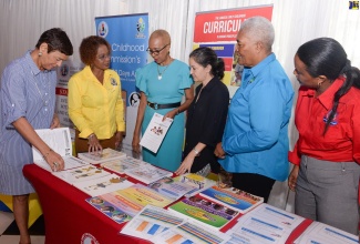 Minister of Education and Youth, Hon. Fayval Williams (third left), listens as Executive Director, Early Childhood Commission (ECC), Karlene DeGrasse-Deslandes (second left), highlights the agency’s work, during a meeting with private sector partners and donors at the Terra Nova All Suite Hotel in Kingston on Thursday (November 17). Others (from left) are: Executive Director, Gore Family Foundation, Christine Gore; Education Specialist, United Nations Children Fund (UNICEF), Rebecca Tortello; Chair, Usain Bolt Foundation, Winsome Wilkins; and Chair, ECC, Trisha Williams-Singh.