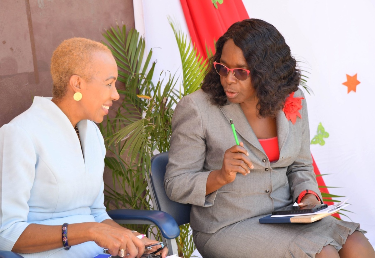 Minister of Education and Youth, Hon. Fayval Williams (left), converses with Acting Principal, Portsmouth Primary School, Celine Haughton, during a prize-giving ceremony held at the school in St. Catherine on November 16. The event was held under the theme ‘Celebrating Excellence’.  