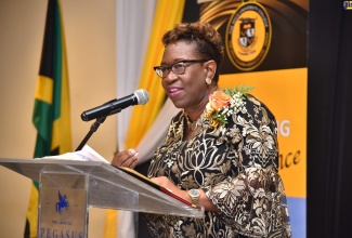 4800: Director of Public Prosecutions (DPP), Paula Llewellyn, delivers remarks at the 2022 Gold Medal Awards organised by The Mico University College and the Mico University College Alumni Association held recently at The Jamaica Pegasus hotel in New Kingston.