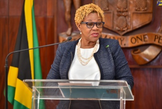 Acting Permanent Secretary in the Ministry of Education and Youth, Maureen Dwyer, addresses a press conference held at Jamaica House on Thursday (December 1).