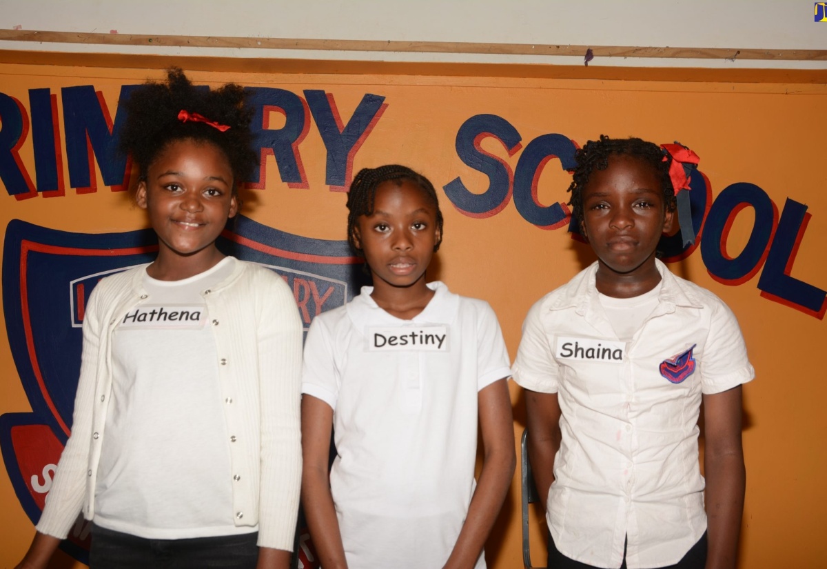 The top-three finishers in the grade-four category of the recent Lucea Primary School Spelling Bee Competition (from left) winner Hathena Dias; first runner-up, Destiny Diaram and second runner-up, Shaina Locke. 