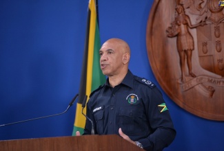 Commissioner of Police, Major General Antony Anderson, addresses press conference at the Office of the Prime Minister in St. Andrew, on December 28, where States of Public Emergency were declared in several parishes by Prime Minister, the Most Hon. Andrew Holness.