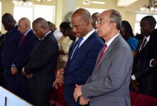 Minister of National Security, Hon. Dr. Horace Chang (right) and Opposition Spokesperson on National Security, Senator Peter Bunting (second right), participate in the National Leadership Prayer Service, held on Sunday (January 15), at the Church of the Open Bible in Kingston.