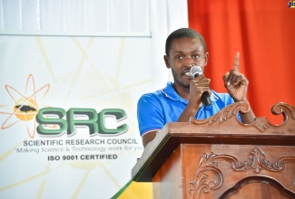 The Scientific Research Council (SRC) Young Scientist of the Year 2022, Dr. Peter Nelson, addresses the sixth staging of the Conversations in Science Series, held on January 20 at the Chinese Benevolent Association in St. Andrew, under the theme ‘Celebrating the Positive Value Men in Science Bring to the World, their Families and Communities’.