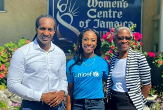 Minister of State in the Ministry of Culture, Gender, Entertainment and Sport, Hon. Alando Terrelonge (left), with Executive Director of the Women’s Centre Foundation of Jamaica, Dr. Zoe Simpson (right) and Ambassador for the United Nations Children's Fund (UNICEF), Shelly-Ann Fraser-Pryce, during a recent visit to the institution.