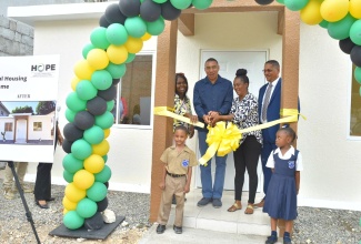 The Government will be moving to improve social conditions in communities such as Kingston Central utilising the Housing Act, says Prime Minister, the Most Hon. Andrew Holness.
	Speaking at the handover of a three-bedroom social housing unit, on Tower Street, in Kingston Central, on January 25, the Prime Minister said the area is one of the oldest residential communities in the island, with many of the houses built over 70 years ago.
          He added that the houses are deteriorating, and a transformation programme is being worked on for such communities.
	Mr. Holness said it is challenging to embark on the upgrading programme, because of ownership issues, where people have abandoned lands in the areas, owners cannot be located, and in some cases, persons have taken them over and “are using them for criminal activities”.
	“We will intervene. We are working on a programme that will use power under the Housing Act to get these lands that are now abandoned and unutilised,” he said, noting that the conditions in such communities cause people not to feel good about their surroundings, so the Government will be improving the infrastructure.
	Meanwhile, the Prime Minister reported that since the recent imposition of a State of Emergency (SOE) in Central Kingston, the murder rate and other violent crime rates have dropped, and residents are pleased for the “reprieve that they are able to enjoy”. 
Mr. Holness said he is satisfied that the State can assist in the provision of improved dwellings under the New Social Housing Programme (NSHP) for “those living under terrible conditions”.
(more)
Social conditions…2
For his part, Member of Parliament for Kingston Central, Donovan Williams, said he is giving priority to the improvement of the housing stock in the constituency, and described the NSHP as a “wonderful programme”.
In the meantime, beneficiary of the housing unit, Keisha Hind, whose previous dwelling was destroyed by fire in 2012,  said the $7 million unit is “a life changing gesture”.
“I want you to know that what you have given us is not just a structure but pride of joy and a sense of belonging,” she added.
 The NSHP, established by the Prime Minister in 2018, operates under the Housing, Opportunity, Production and Employment Programme (HOPE), through the Ministry of Economic Growth and Job Creation. The initiative aims to improve the housing conditions of Jamaica's most needy citizens.
It consists of three modalities – provision of indigent housing, which will see 315 housing units (five per constituency) constructed per annum; relocation of vulnerable communities, which will give priority to persons in imminent danger; and the upgrading of tenement yards (one per constituency).
