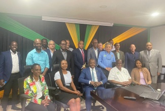 Minister of Agriculture and Fisheries, Hon. Pearnel Charles Jr. (seated, centre), and State Minister, Franklyn Witter (seated, fourth left),  with Board Chairpersons of entities under the Ministry, after a recent meeting at the Ministry’s head office in Kingston.