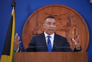 Prime Minister, the Most Hon. Andrew Holness, addresses a press conference at the Office of the Prime Minister recently to announce states of public emergency (SOEs) in several parishes islandwide.