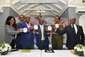 Mugs are raised for the official launch of the Jamaica Blue Mountain Coffee Festival, which will take place on Saturday, March 25, 2023. Celebrating  (from left) are Chair, Gastronomy Network, Nicola Madden-Greig; Executive Director, Tourism Enhancement Fund, Dr. Carey Wallace;  Tourism Minister, Hon. Edmund Bartlett (third left); Agriculture and Fisheries Minister, Hon. Pearnel Charles Jr., Member of Parliament for St. Andrew East Rural, Juliet Holness, and Minister of Industry, Investment and Commerce, Senator the Hon. Aubyn Hill. The ceremony  was held at Devon House in Kingston, on January 9.