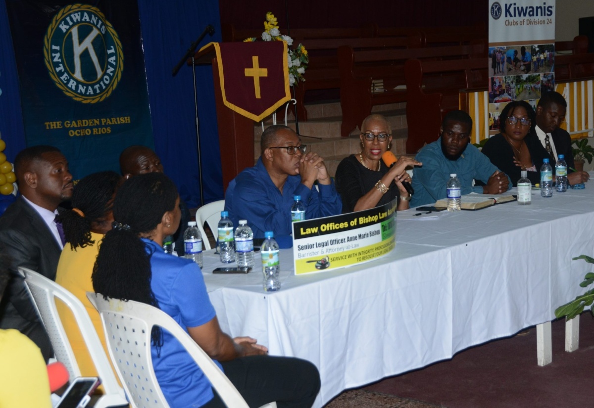 Education and Youth Minister, Hon. Fayval Williams (second left, head table), addresses the Kiwanis Club of St. Ann ‘Violence in Schools and its Impact on Society’ seminar, held at First Assembly of God in Ocho Rios, St. Ann, on Sunday (February 26). 