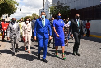 Prime Minister, the Most Hon. Andrew Holness (front left), his wife, Member of Parliament for St. Andrew East Rural, the Most Hon. Juliet Holness (centre) and Minister of Tourism, Hon. Edmund Bartlett (front, right), lead government legislators to Gordon House for the Ceremonial Opening of Parliament last year.