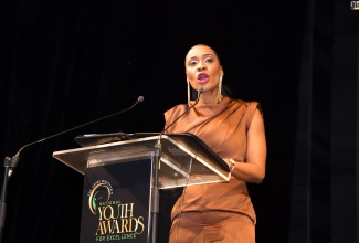 Managing Director, HEART/NSTA Trust, Dr. Taneisha Ingleton, addressing the recent staging of the Prime Minister’s Youth Awards for Excellence at Jamaica House.