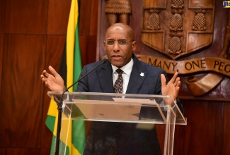 Minister of Industry, Investment and Commerce, Senator the Hon. Aubyn Hill, addresses journalists during a press conference on Monday (March 6) at Jamaica House where he outlined plans of the Government to support small cannabis farmers.