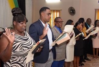 New Justices of the Peace (JP) for the parish of Clarendon take the Oath of Office at a commissioning ceremony on Friday (March 24), at the  Wembley Centre of Excellence, Cornpiece Road in Hayes.