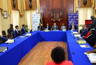 Prime Minister, the Most Hon. Andrew Holness (centre, head table), addresses members of the newly appointed Constitutional Reform Committee at its first meeting, today (March 22) in the Banquet Hall at the Office of the Prime Minister.