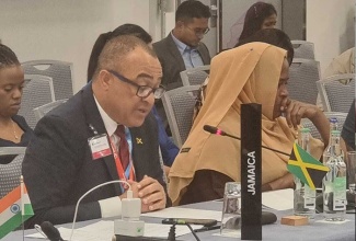 Minister of Health and Wellness, Dr. the Hon. Christopher Tufton, addresses the recent Commonwealth Health Ministers Meeting in Geneva, Switzerland.