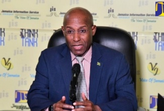 Minister of Industry, Investment, and Commerce, Senator the Hon. Aubyn Hill