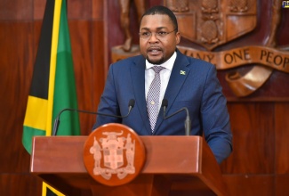 Minister without Portfolio with responsibility for Information, Hon. Robert Morgan, addressing Wednesday’s (June 7) post-Cabinet press briefing at Jamaica House in St. Andrew.