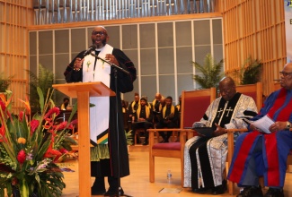 Senior Pastor at the Webster Memorial United Church in St. Andrew, Rev. Astor Carlyle, delivers the sermon at a thanksgiving service to mark Jamaica’s Emancipation and Independence, at the Sligo Seventh-day Adventist Church in Takoma Park, Maryland, on Sunday (July 30). Listening are Rev. Dr. Bertram Melbourne (second right), Dean of Howard University School of Divinity and Rev Dr. Kortright Davis.