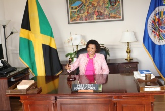 Jamaica’s Ambassador to the United States (US), Audrey Marks, who is the new Chair of the Permanent Council of the Organization of American States (OAS), bangs the gavel, during Monday’s (July 17) installation ceremony held at the Halls of the Americas in Washington DC.