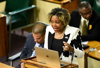 Minister without Portfolio in the Office of the Prime Minister, Senator Dr. the Hon. Dana Morris Dixon, makes her contribution to the State of the Nation Debate in the Senate on Friday (July 14).