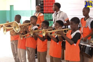 Members of the Tivoli Gardens Drum Corps in performance.