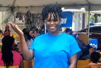 Operator of the dental department at the NADS Family Health Care in St. Catherine, Dr. Simone Brady, at the community health fair, held at the Green Acres Commercial Business Complex in the parish, on August 13.