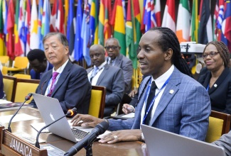 Minister of State in the Ministry of Foreign Affairs and Foreign Trade, Hon. Alando Terrelonge, addresses the 28th Session of the Assembly of the International Seabed Authority (ISA) in downtown Kingston, on July 25.