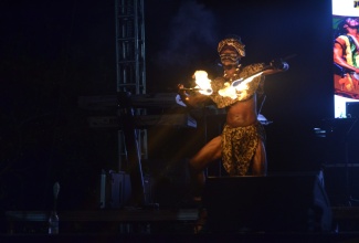 Fire artist  ‘Jungle King’ gives a scintillating performance at the Emancipation Jubilee held at the Seville Heritage Park in St. Ann on Monday (July 31).