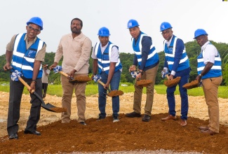 Prime Minister, the Most Hon. Andrew Holness (fourth left), participates in the breaking of ground for the $907 million Sheffield Palms housing development in Retreat, Westmoreland, on Friday, August 11. He is joined by (from left)  Acting Managing Director of the National Housing Trust (NHT), Donald Moore; Member of Parliament, Westmoreland Eastern, Daniel Lawrence; Director of Sheffield Palms Limited, Chescot Brownie; Member of Parliament, Westmoreland Western, Morland Wilson; and NHT Board Member, Doran Dixon.