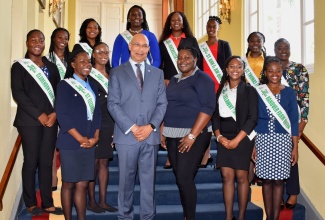 Governor-General, His Excellency the Most Hon. Sir Patrick Allen (second left, front row), shares a photo opportunity with 2023 parish queens, who will be vying for the National Farm Queen title, during a courtesy call at King’s House on August 3.