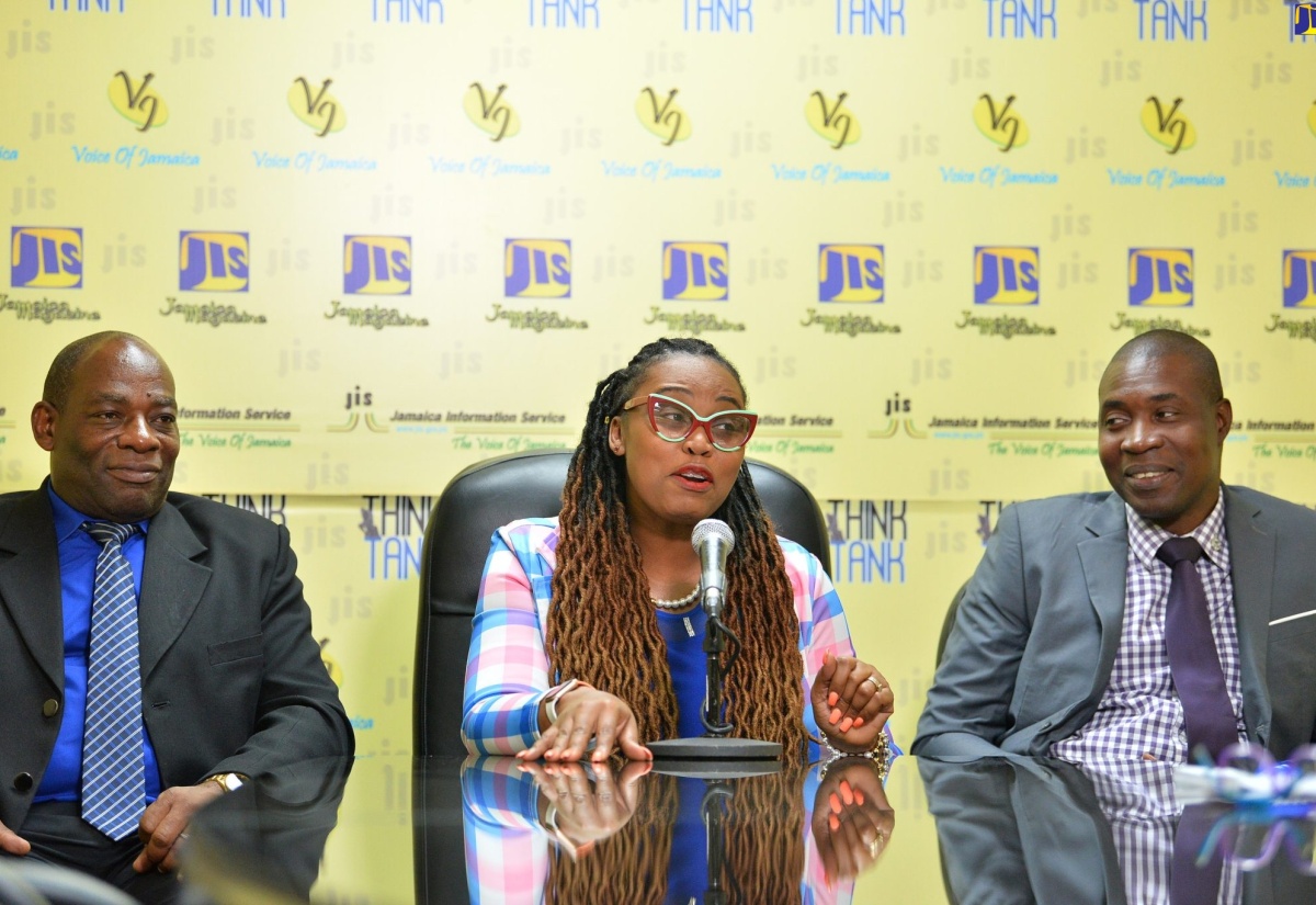 President of the Jamaica Civil Service Association (JCSA), Techa Clarke-Griffiths (centre), addresses a JIS Think Tank on September 8, where she highlighted activities for International Coastal Cleanup (ICC) Day on Saturday, September 16. She is flanked by First Vice President, Clarence Frater (left) and Second Vice President, Kelvin Thomas.