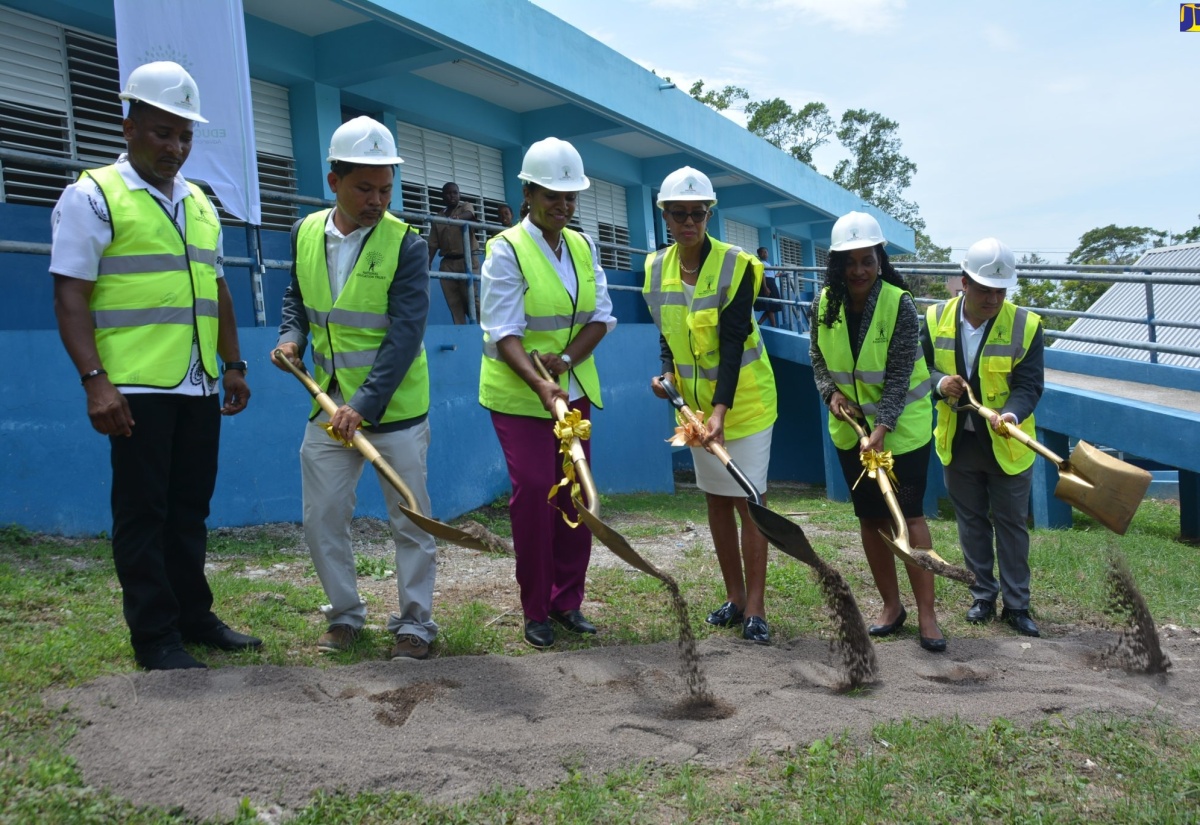 Minister of Education and Youth, Hon. Fayval William (fourth left)), and State Minister, Hon. Marsha Smith (second right), break ground for infrastructure works at Exchange All-Age School in St. Ann on Wednesday (September 6). They are joined by (from left), Principal of the school, Ricardo Moncrieffe; Board Chairman, Gregory Chung; Executive Director of the National Education Trust (NET), Latoya Harris-Ghartey; and Minister without Portfolio in the Ministry of Economic Growth & Job Creation (MEGJC), Senator the Hon. Matthew Samuda.