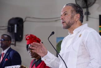 President of the Senate, Tom Tavares-Finson, brings greetings at the National Heritage Week church service held on Sunday (Oct.15), at the Bethel Temple Apostolic Church in May Pen, Clarendon.