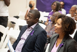 Chief Executive Officer of the National Health Fund (NHF), Everton Anderson (left), and President of the Lupus Foundation of Jamaica (LFJ), Dr. Desiree Tulloch-Reid (right), at the launch of Lupus Awareness Month, held on October 4 at the LFJ Learning and Help Centre in New Kingston.