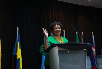 Chairperson of the Maritime Authority of Jamaica, Corah Ann Robertson Sylvester, addresses the opening ceremony of the sixth Annual General Meeting of the Women in Maritime Association Caribbean (WiMAC) Regional Conference, which is being held from October 3 to 5 at the Ocean Coral Spring Resort in Trelawny.

